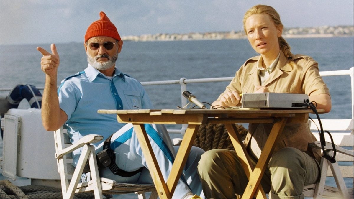 Steve Zissou (Bill Murray) and Jane Winslett-Richardson (Cate Blanchett) sit next to each other aboard the Bonafante.