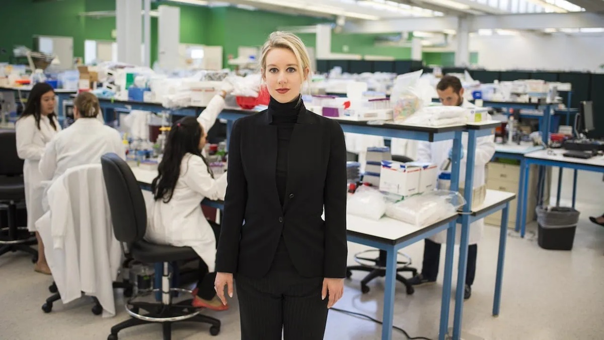 Elizabeth Holmes in front of a lab