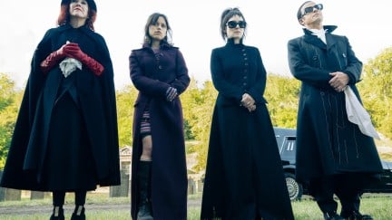 Delia, Astrid, Lydia, and Rory all standing in black in a line