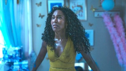 DeWanda Wise looking frightened in a yellow dress as Jessica in Imaginary