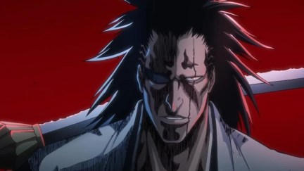 Kenpachi Zaraki holds a sword over his shoulder in 