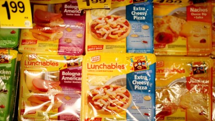 Extra Cheesy Pizza and Nacho Lunchables at a grocery store