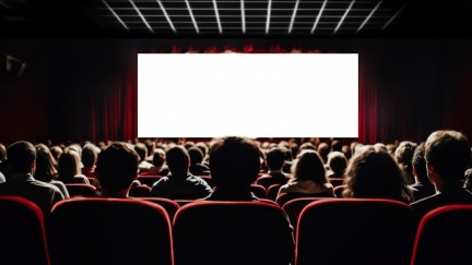 Theatergoers watch a movie