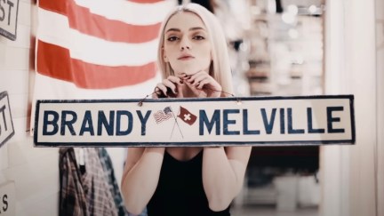 a model holding up a bradny melville sign