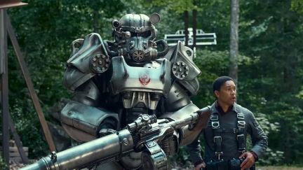 Maximus (Aaron Moten) standing next to a suit of armor in 'Fallout'