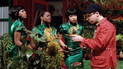 the singers with seymour in little shop of horrors looking at plants