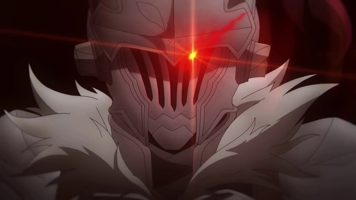 Red light shines out of an armored man's helmet in "Goblin Slayer"