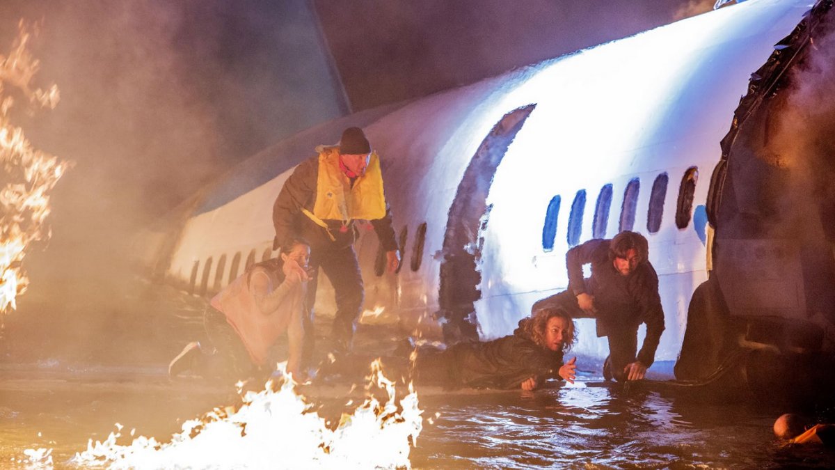 Passengers escaping a downed plane in 9-1-1