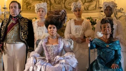 Queen Charlotte, Lady Danbury and Brimsely looking over the couples dancing at the ball in episode 2 of Bridgerton season 3