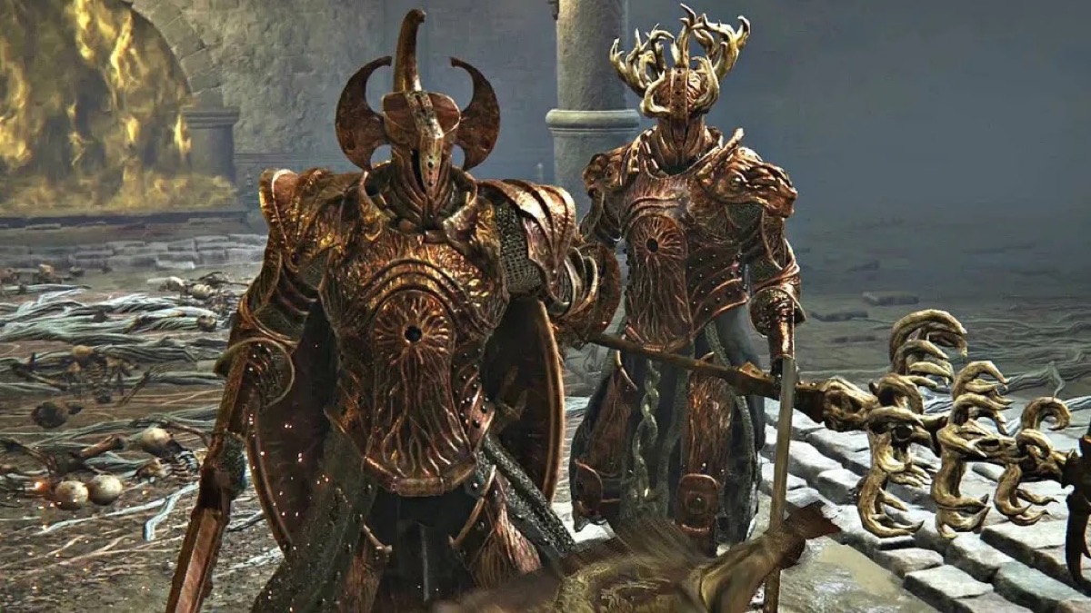 Two golden knights stand in a chamber holding weapons in "Elden Ring"