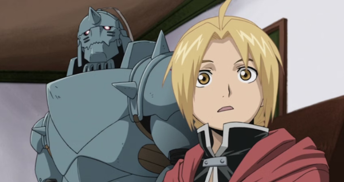 A young boy and a living suit of armor look surprised in "Full Metal Alchemist" 