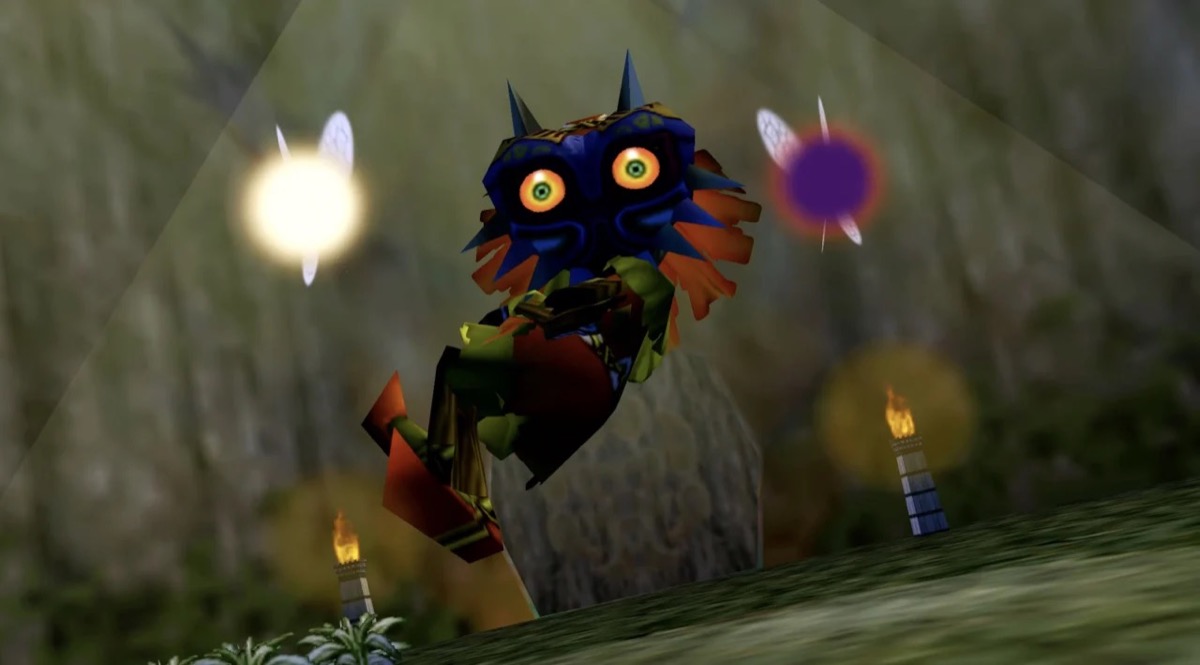 Skull Kid wears Majora's Mask and floats through the air surrounded by fairies in "Majora's Mask" 