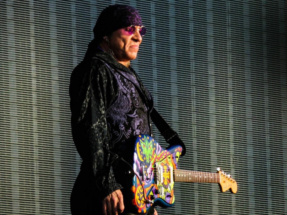 Stevie Van Zandt wearing his guitar on stage
