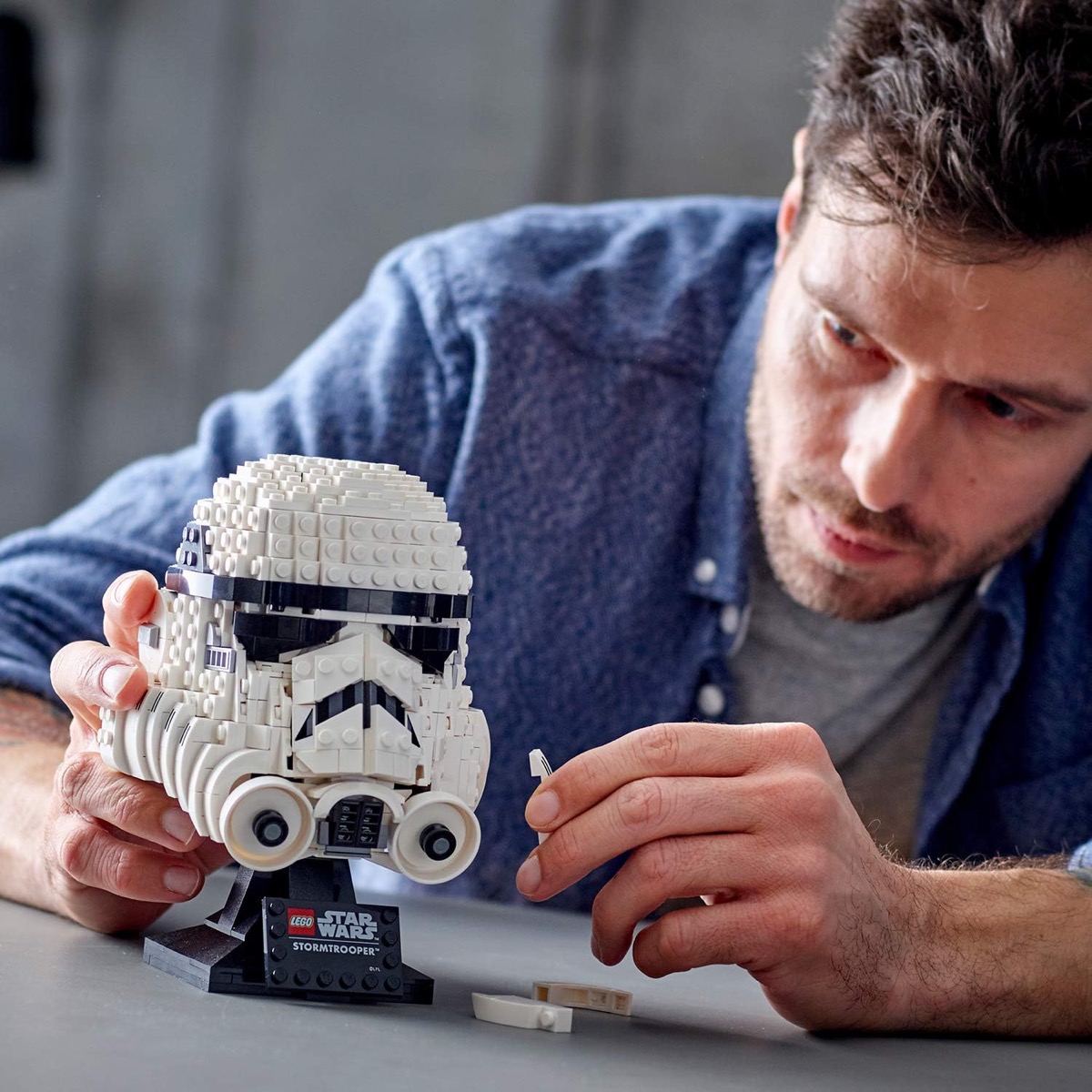 A LEGO version of a Stormtrooper helmet from "Star Wars "