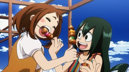 Ochako and Tsuyo eating snacks and smiling in 