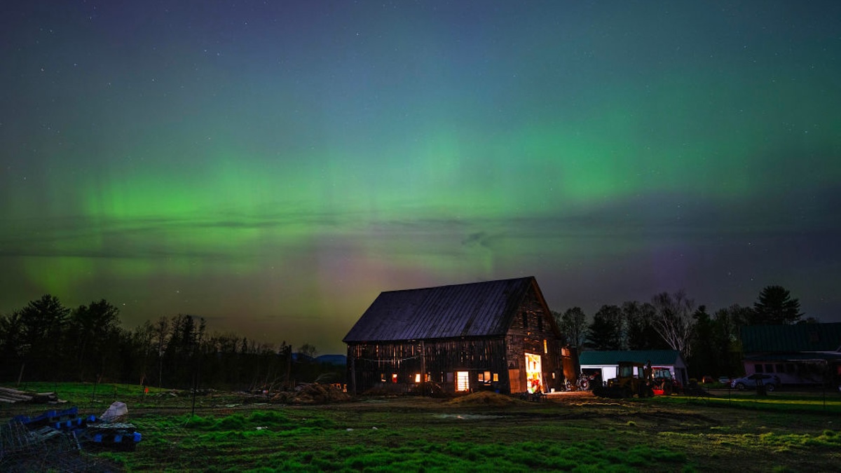 Aurora Borealis over a farmhouse.