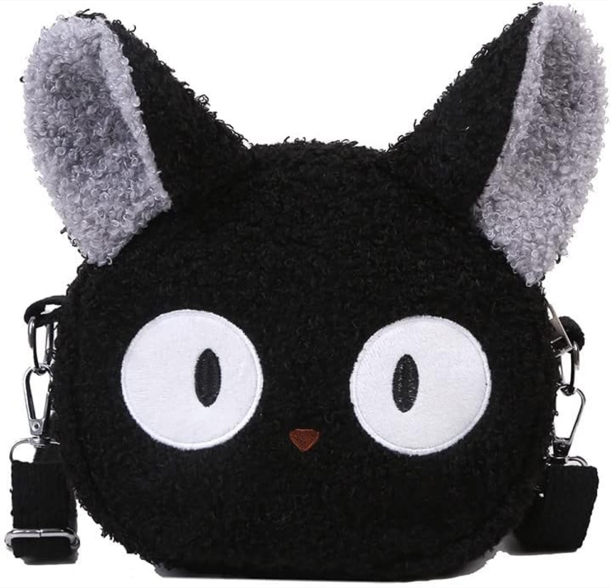 A purse shaped like a black anime cat