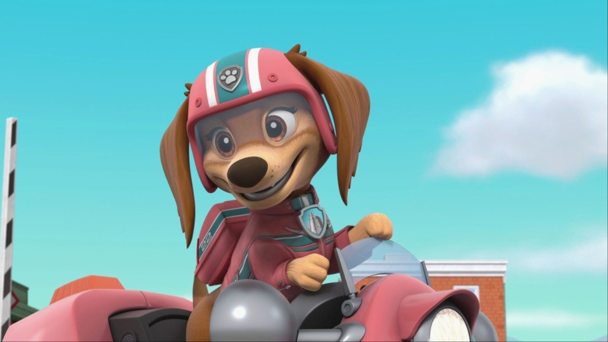 Liberty wears a ink uniform and rides a scooter in 'Paw Patrol'.