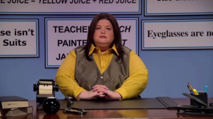 lori beth denberg sitting at the vital information desk