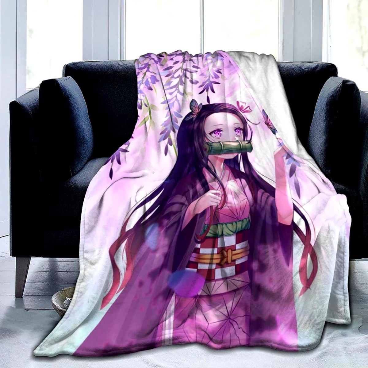 a throw blanket featuring Nezuko from "Demon Slayer" 