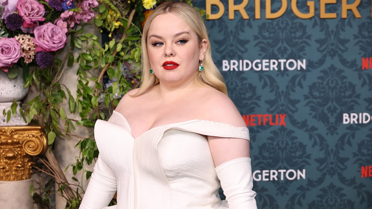 Nicola Coughlan on the carpet at the Bridgerton premiere in a white dress