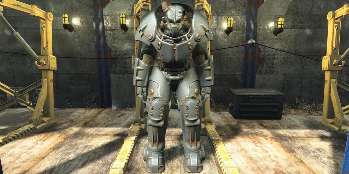 A suit of power armor stands empty in a hangar in "Fallout 4"