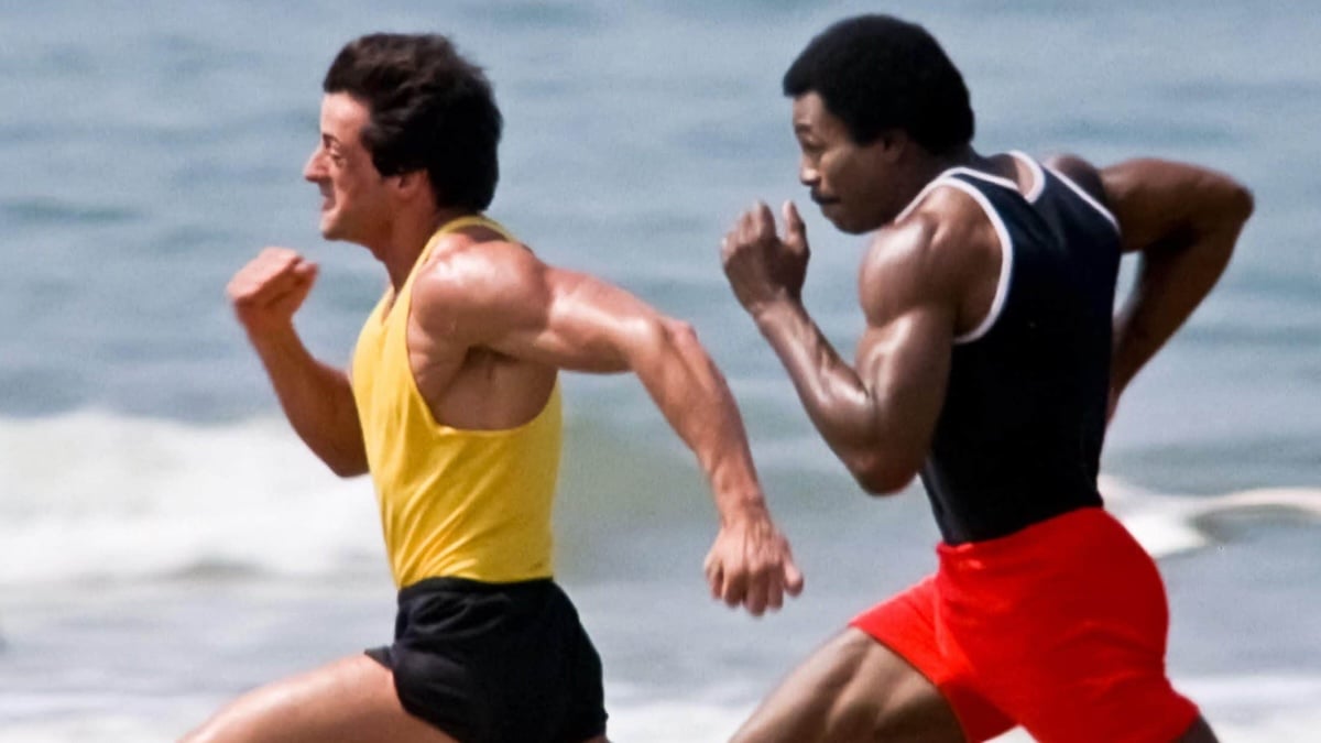 rocky balboa and apollo creed running on the beach together