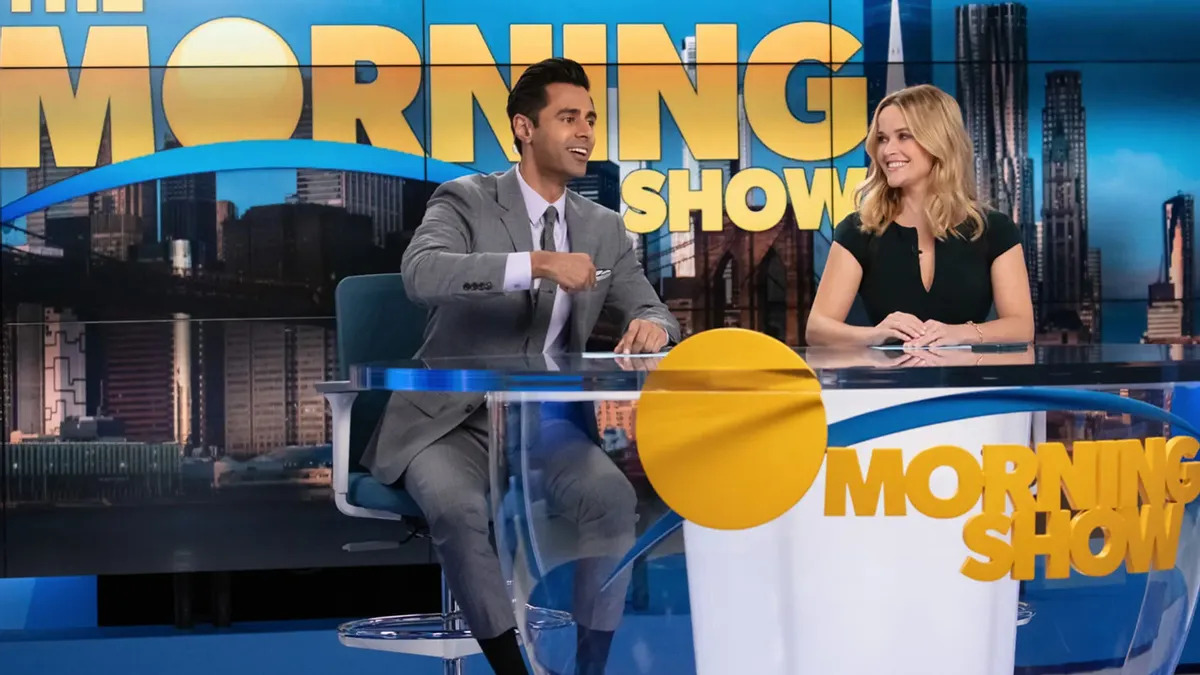 Hasan Minhaj and Reese Witherspoon in a still from 'The Morning Show'