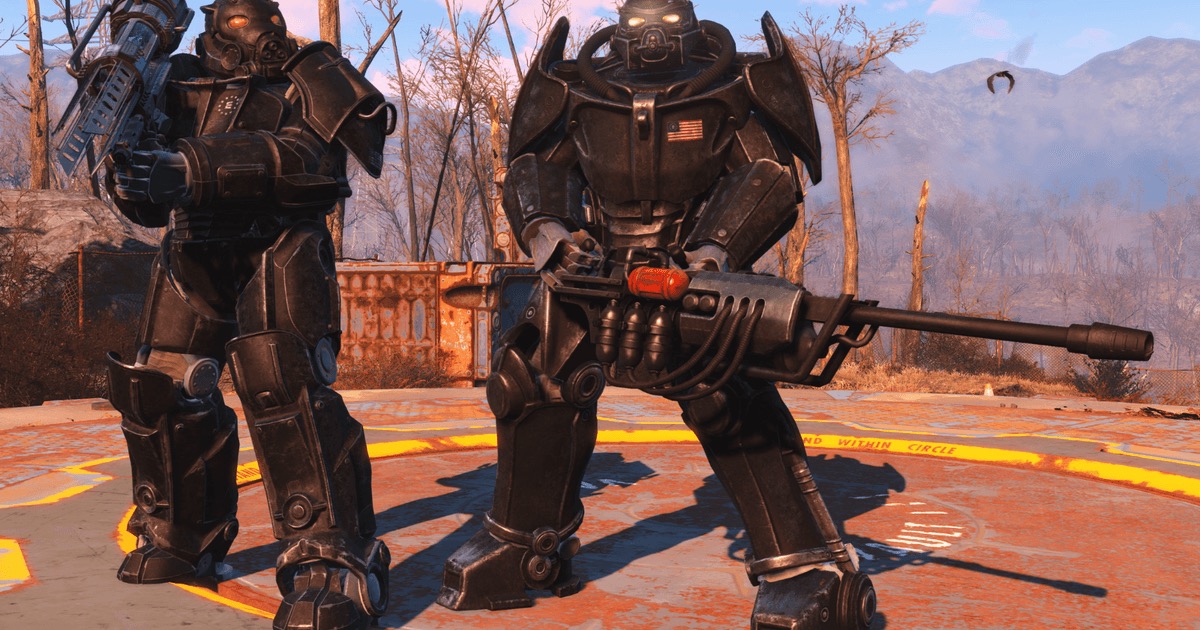 Two men in power armor stand in the forest with guns in "Fallout 4"