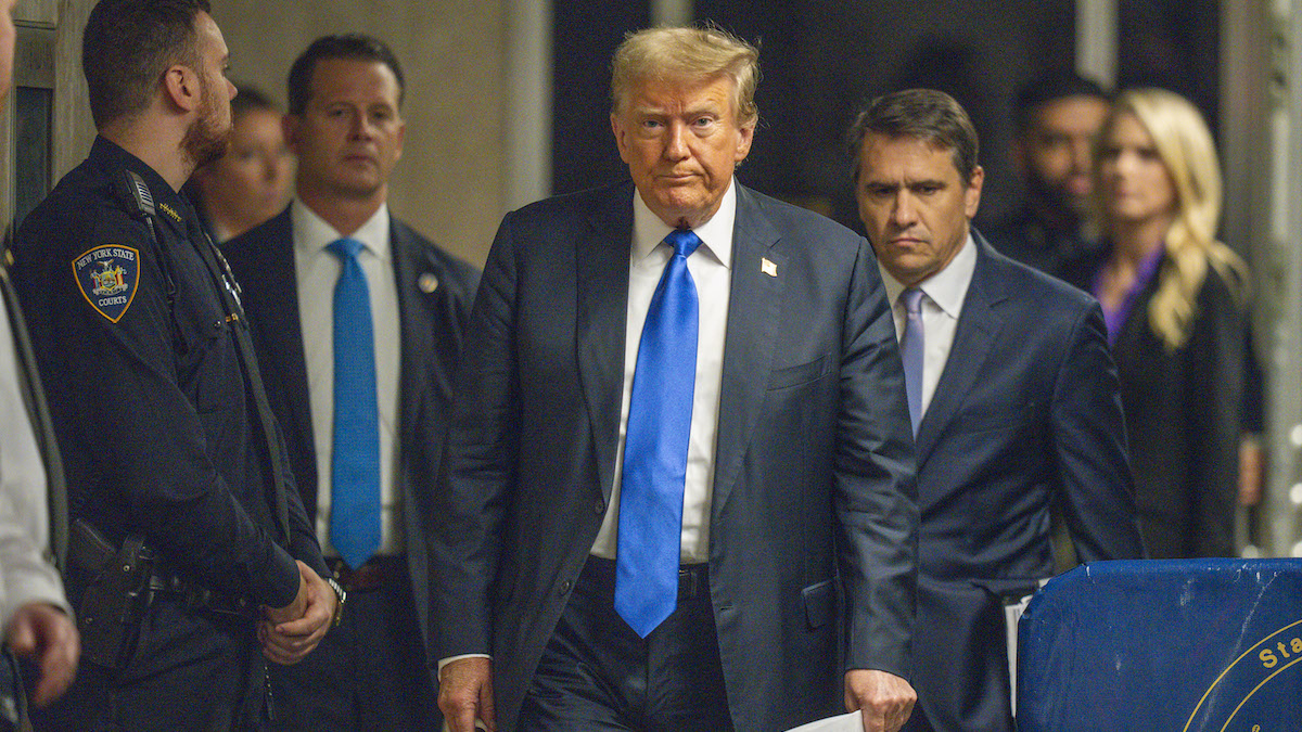 Donald Trump arrives at a courthouse