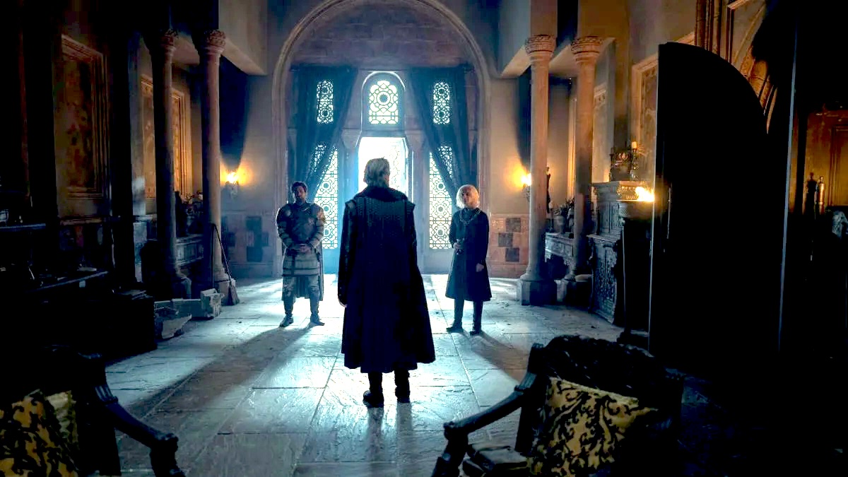 Ser Otto Hightower, back to the camera, looks at his grandson, King Aegon and Ser Criston Cole in House of the Dragon season 2 episode 2