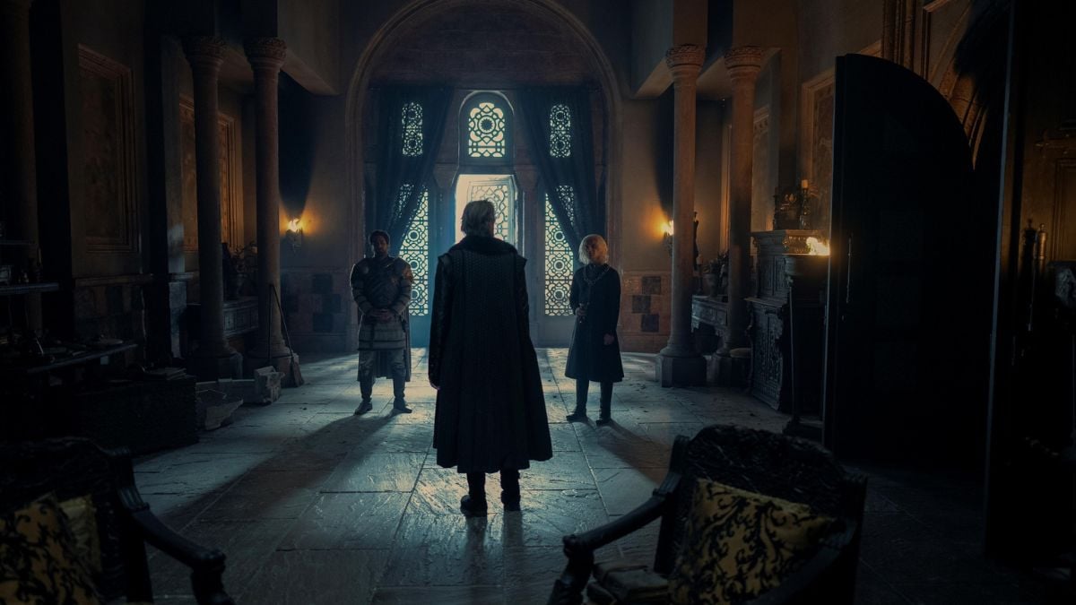 Ser Otto Hightower, back to the camera, looks at his grandson, King Aegon and Ser Criston Cole in  House of the Dragon season 2 episode 2