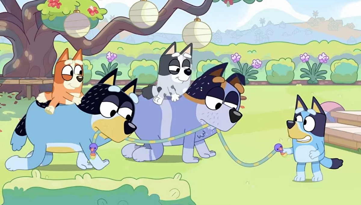 Bingo and Muffin riding Bandit and Stripe while Bluey helps