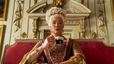 Queen Charlotte holding a fancy tea cup