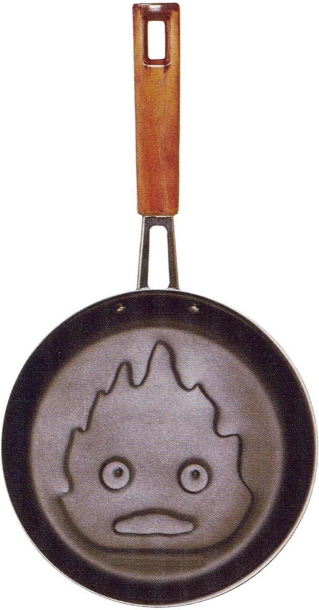 A frying pan with Calcifer's face from "Howl's Moving Castle" 