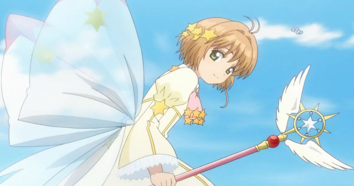 A magical girl with butterfly wings flies holding a magical staff in "Cardcaptor Sakura"
