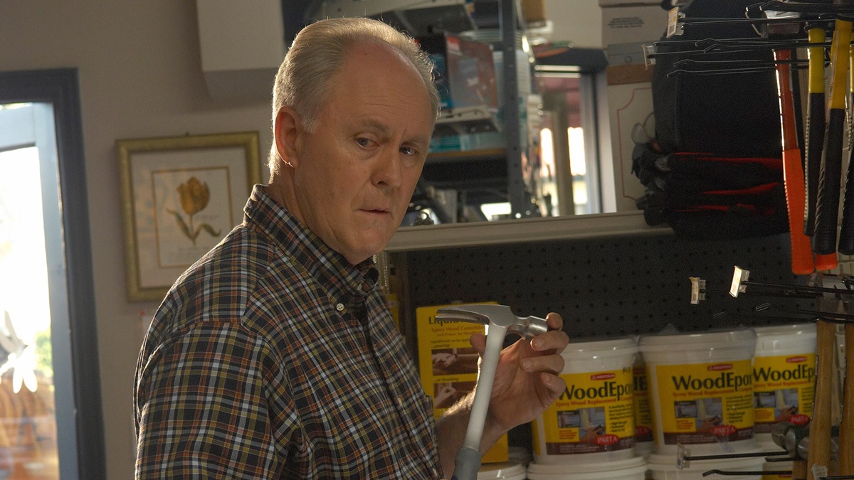 John Lithgow holding a hammer in Dexter