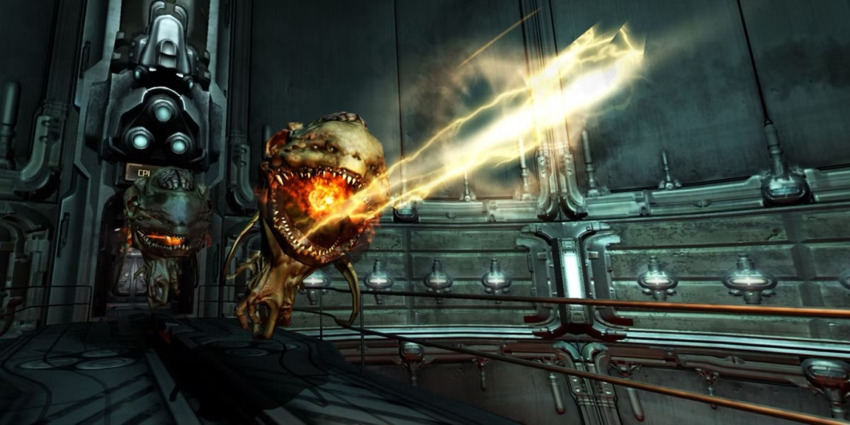 A floating demon shoots a death ray from its mouth in "Doom 3"