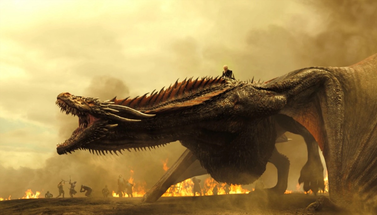 The black dragon Drogon roars on a battlefield while ridden by Daenerys Targaryen in "Game of Thrones"
