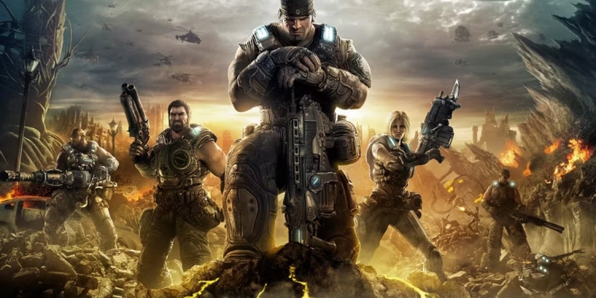 Soldiers stand over the corpses of fallen aliens in "Gears of War 3" 