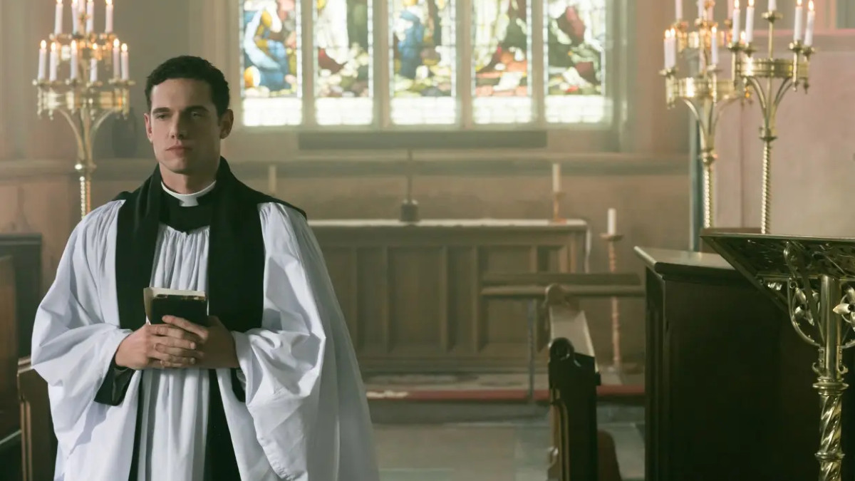 Tom Brittney as Will Davenport in Grantchester, giving a sermon in the Church of St. Andrew and St. Mary 