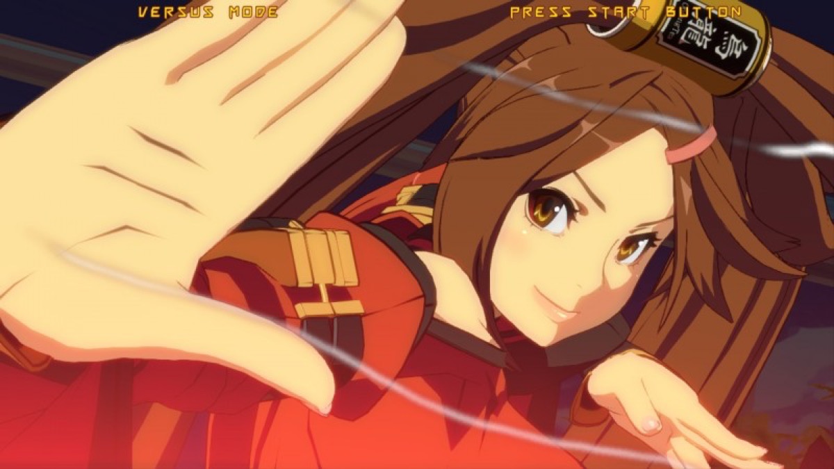 A smirking woman raises her palm in combat in "Gulity Gear Xrd"