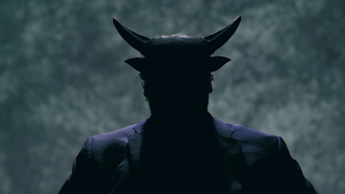 A shadowy figure wears devil horns in "Hail Satan?"