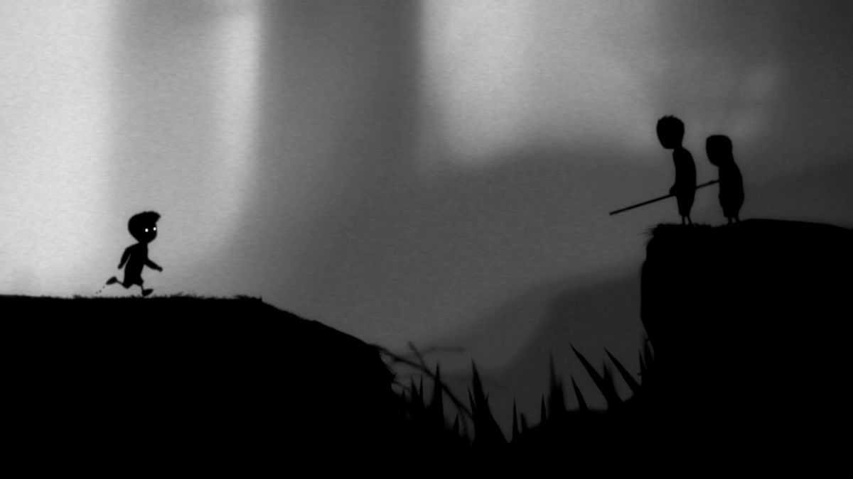 A young boy in a dark forest looks across a gap at two shadowy figures in "Limbo"