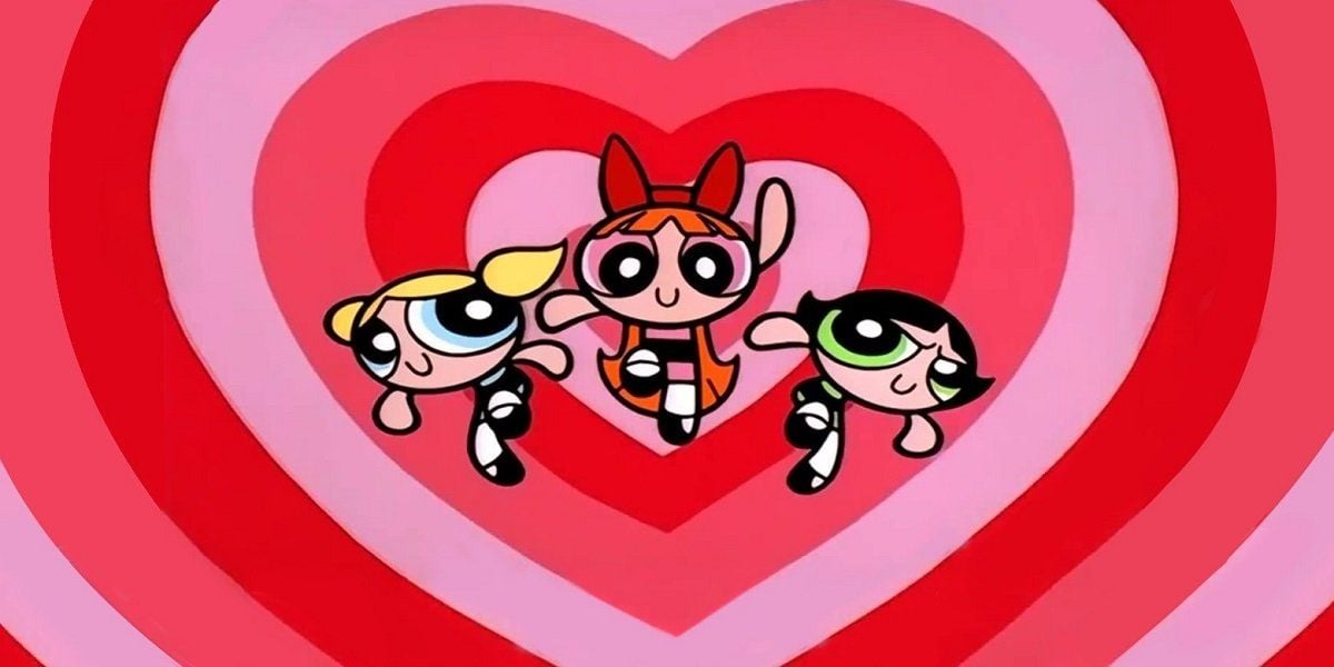 The Powerpuff Girls float in front of a heart design