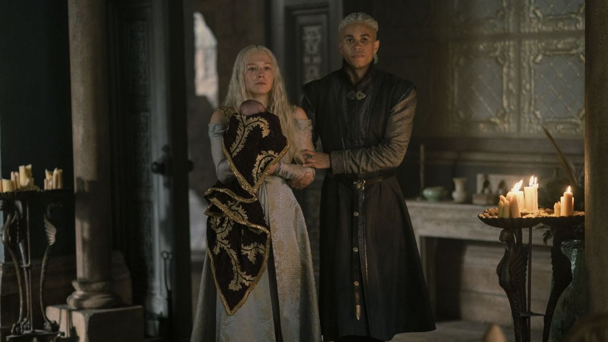 Rhaenyra Targaryen holds her newborn son Joffrey and stands with Laenor Velaryon in episode 5 of House of the Dragon
