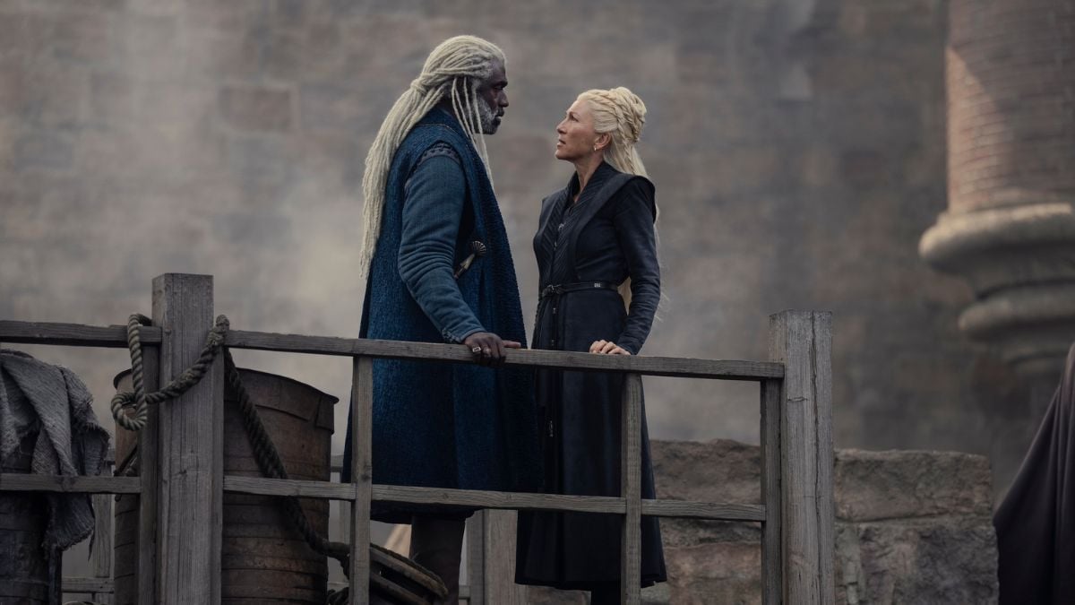 Steve Toussaint as Corlys Velaryon and Eve Best as Rhaenys Targaryen stand on a bridge in House of the Dragon season 2