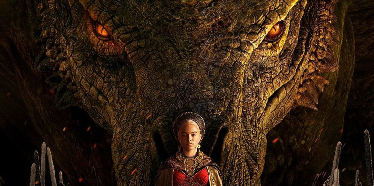 Young Rhaenyra Targaryen stands in front of her dragon Syrax