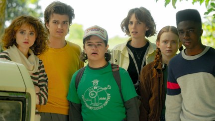 Nancy, Steve, Dustin, Robin, Max, and Lucas looking confused in Stranger Things season 4