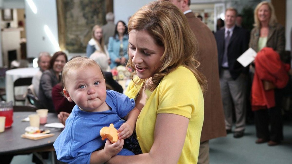 Pam holding her baby